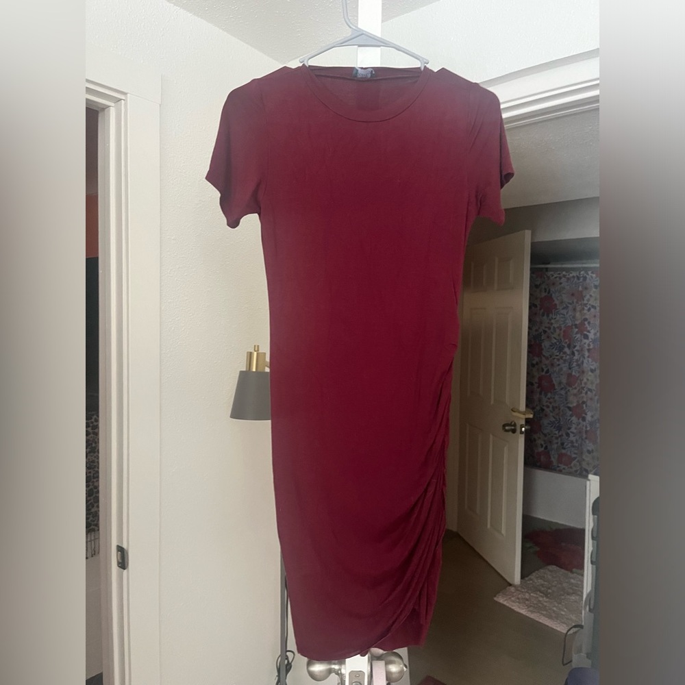 Size medium women’s maroon skin tight t-shirt dress with ruched side